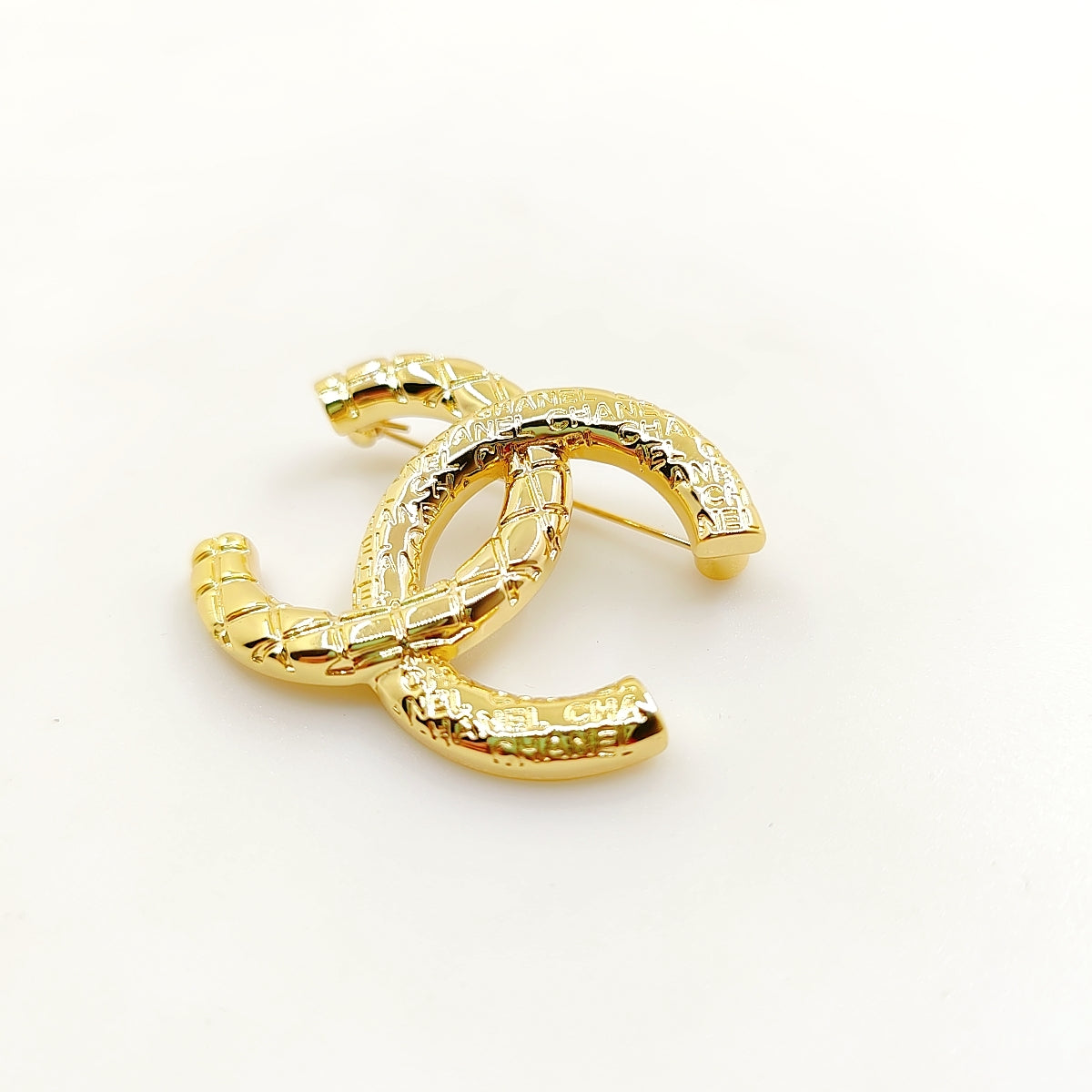 Chanel 24S 18K Gold Brooch