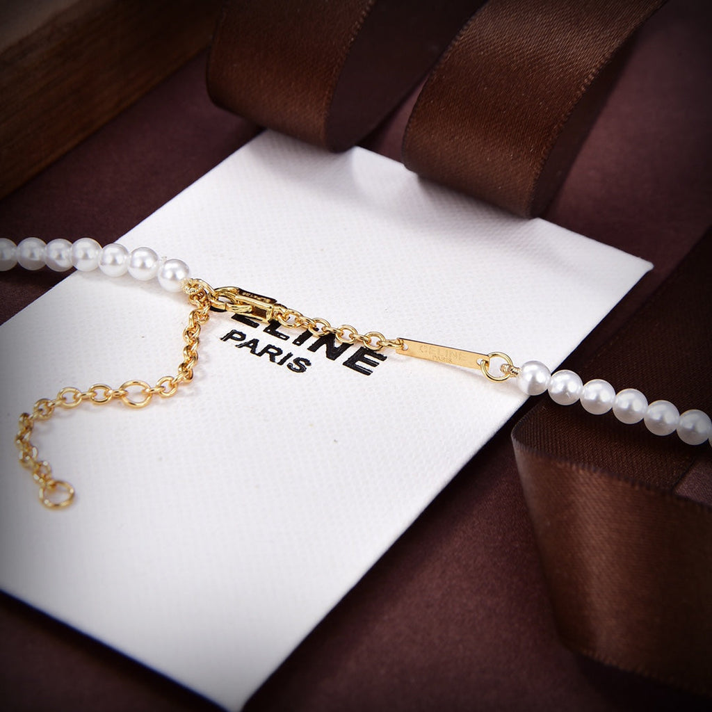 Celine Paris Pearls 18K Gold Bracelet